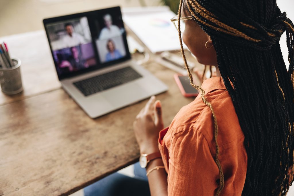Woman attending a virtual meeting.