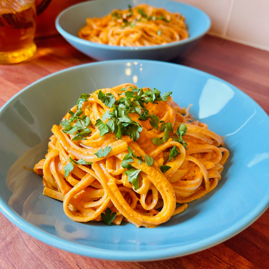 Linguine pasta in a blue bowl