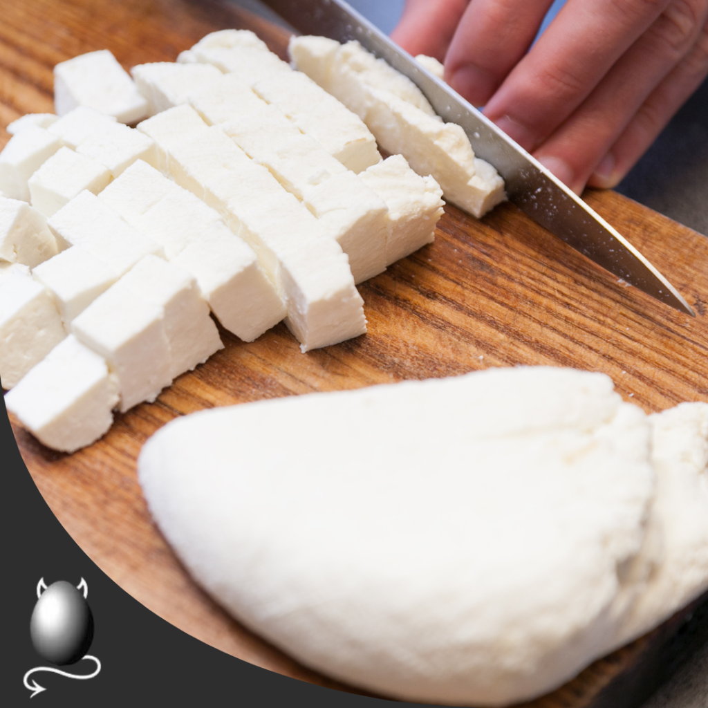 chopping freshly made paneer