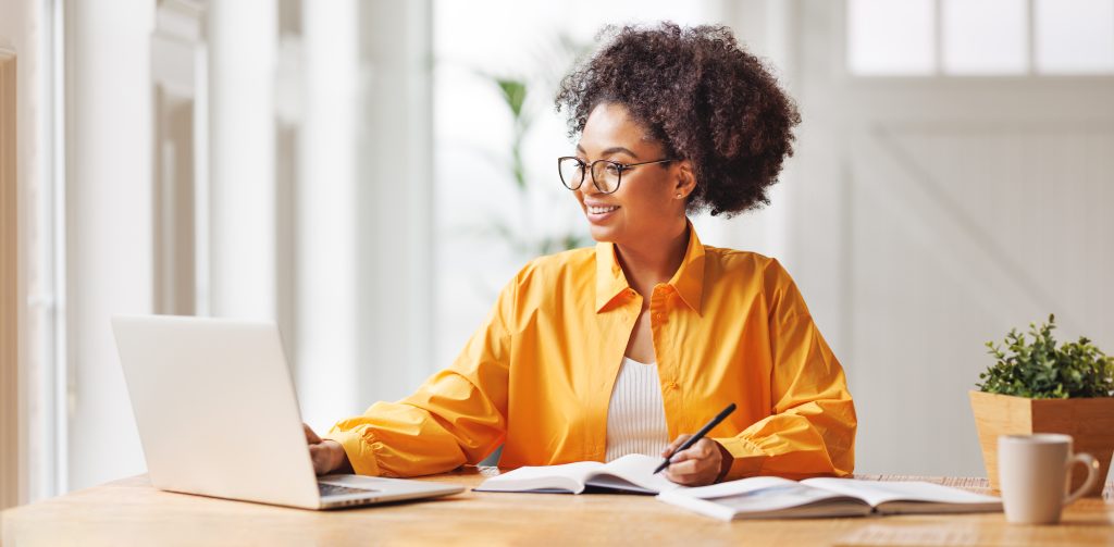 woman working on laptop at home